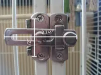 Latch on Rosies cage.webp