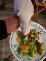 SnowyEatingVeg.webp